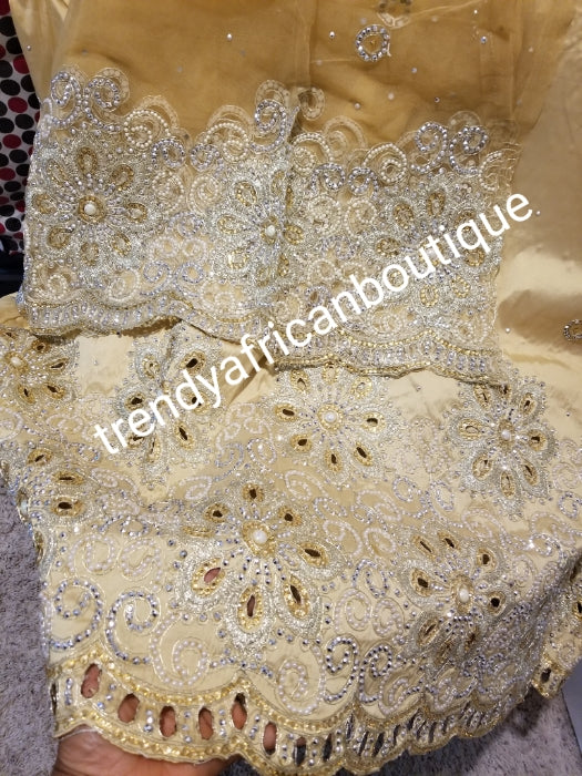 Sale: New arrival Nigerian Tranditional wedding George wrapper. Embellished with quality dazzling beads/crystal stones. Classic Gold. Full 5yds + 1.8yds matching blouse + free headtie. Indian-George made with original taffeta silk