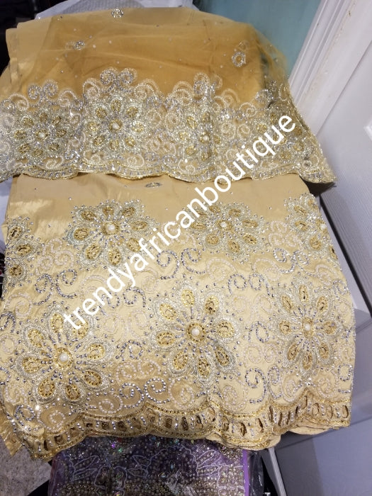Sale: New arrival Nigerian Tranditional wedding George wrapper. Embellished with quality dazzling beads/crystal stones. Classic Gold. Full 5yds + 1.8yds matching blouse + free headtie. Indian-George made with original taffeta silk