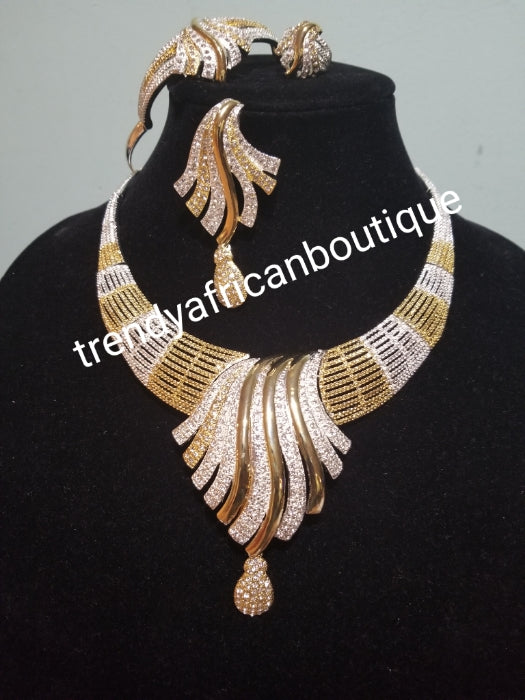 Sale sale: Beautiful Dubai costume jewelry set in 18k two tone gold plating. High quality hypoallergenic jewelry set. 4pcs set. Sold per set. Embellished with crystal stones.