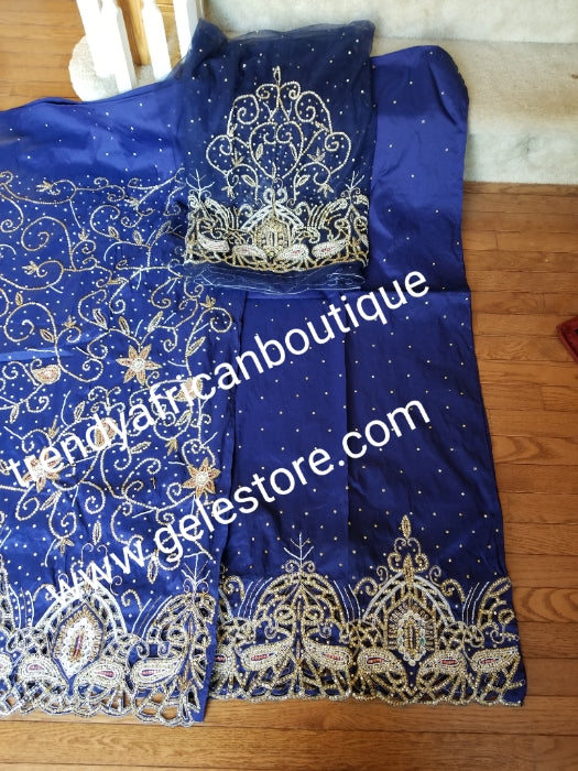 New arrival Navy Blue VIP Silk George wrapper. 2.5yds top wrapper heavily beaded and crystal stones + 2.5yds bottom wrapper stone border + 1.8yds net blouse. Use For  Nigerian weddings/Ceremonies.
