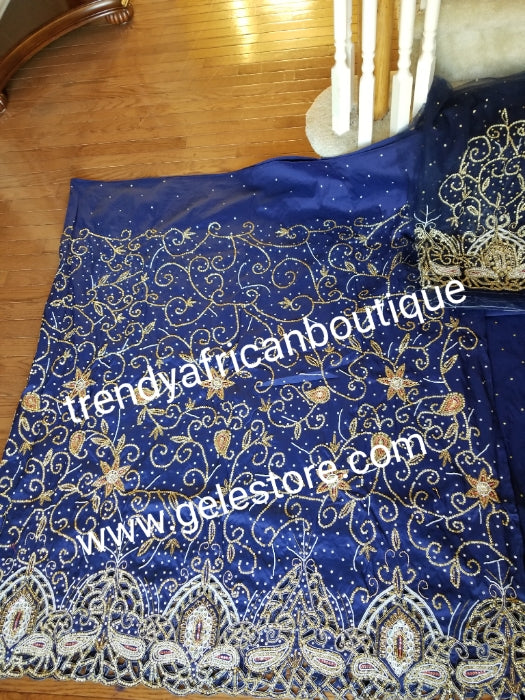 New arrival Navy Blue VIP Silk George wrapper. 2.5yds top wrapper heavily beaded and crystal stones + 2.5yds bottom wrapper stone border + 1.8yds net blouse. Use For  Nigerian weddings/Ceremonies.