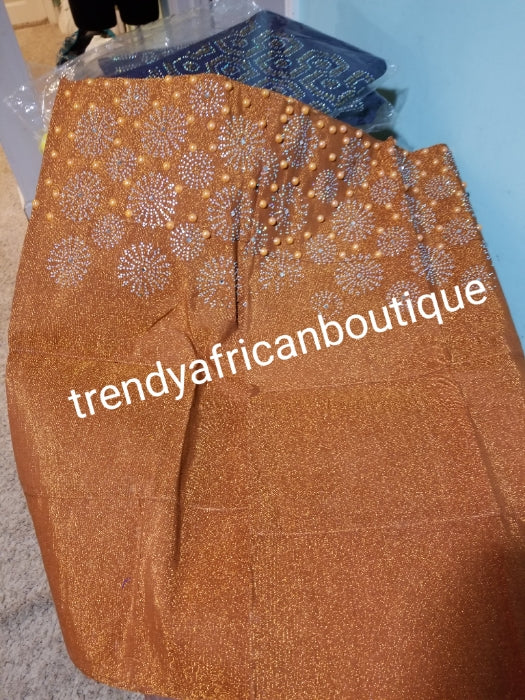 Classic Burnt Orange Bedazzled aso-oke. Nigerian woven traditional Aso-oke for making beautiful head wrap. Beaded and Swarovski stones work for perfect headwrap finish. Gele only. Extra wide gele for bigger head wrap. 72" long × 26" wide