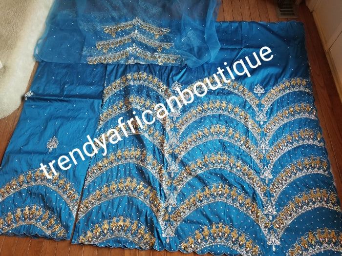 Ready to ship:  Exclusive design Turqouis blue VIP hand beaded and stoned Nigerian traditional Celebrant in quality taffeta Silk George wrapper with matching blouse. Niger/Delta/Igbo women Georges. Sold as set of 2 wrapper +1.8yds blouse.