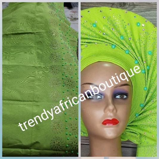 Beautiful Lemon Green aso-oke. Nigerian traditional Aso-oke for making head wrap. Hand woven and beaddazzled with crystal stones and beads at the border for perfect headwrap finish. Gele only. Extra wide gele for bigger head wrap. 74" long × 26" wide
