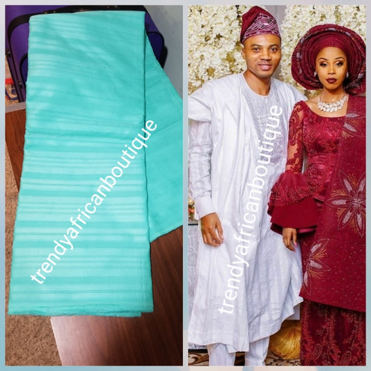 Mint Green Top quality cotton voile  fabric for Nigerian Men native outfit. Soft quality fabric. Can be use for agbada/3pc outfit for men. Sold per 5yds. Price is for 5yds