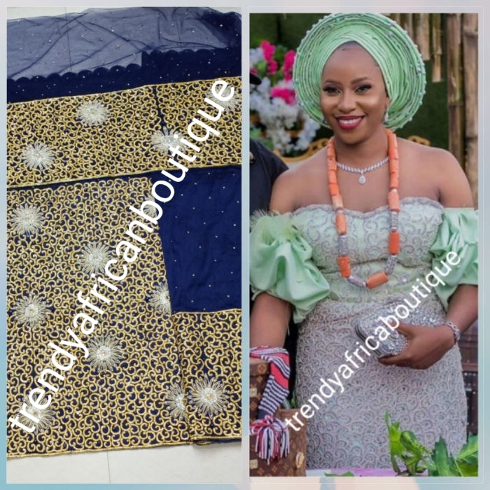 Sale: Ready to ship: Navy blue/Gold first Lady/ VIP Nigerian Celebrant Silk George wrapper. All over hand cut with gold crystal stones in flower design. 2 wrapper (2.5yd each) + 1.8yds net for blouse. Niger/Igbo/delta bridal outfit wrapper