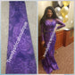 Sale: African french lace fabric in sizzling Purple color. All over stones. Sold 5yds. Model shown rocking same Lace in sizzling evening gown