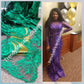 African net french lace fabric with all over stones. GREEN color. Sold 5yds. Model shown wearing purple