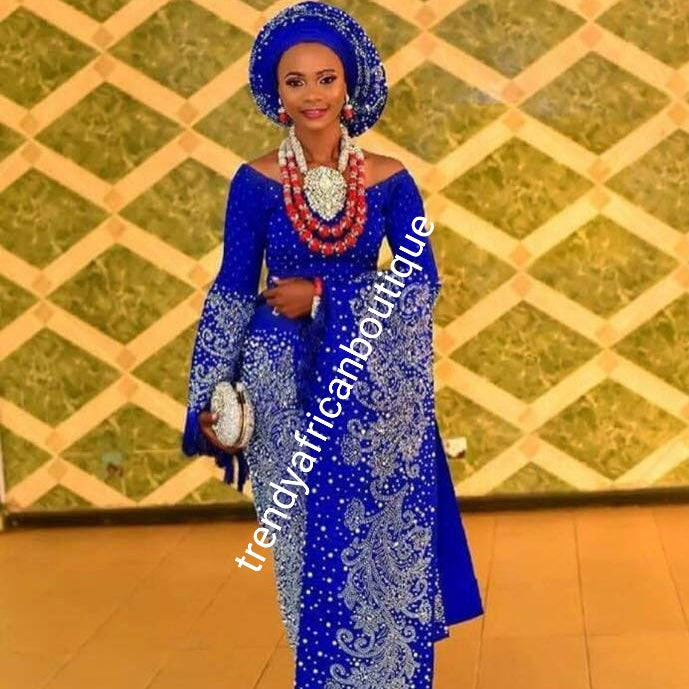 Custom-made Quality Swarovski stones, beaddazzled 4pc Aso-oke set + feather hand fan bonus. Made-to-order Nigerian Traditional wedding Bridal outfit for women. Allow 6-8 weeks for delivery. Can be made in any color of your choice