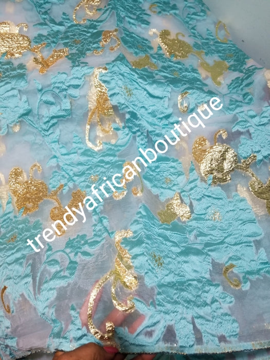 Beautiful sky blue/gold organza  french lace fabric/gold lurex.  latest design. Sold per 5yds. Nigerian/African french lace for making party outfit. Soft texture, luxurious design