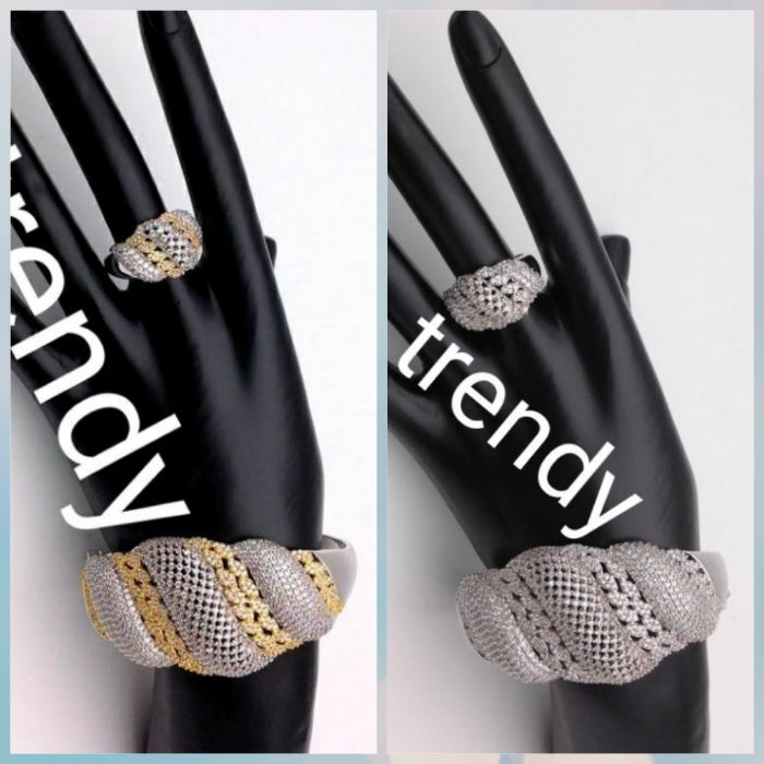 22k electroplated Bangle and Ring set. Dubai Hand set with CZ stones. Beautiful bangle. Available in 2 tone and all silver. Ring is one size fit