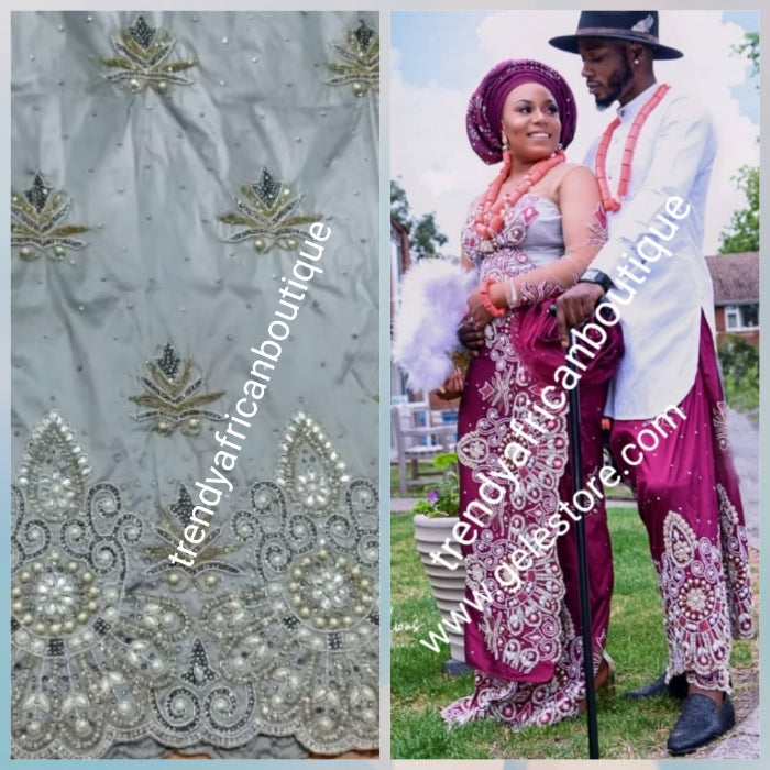 Ready to ship quality ash/Gray Taffeta Silk Beaded and Stoned Nigerian traditional wedding George wrapper. Classic Wrapper for Niger/Igbo/delta wedding outfit. Sold as 2 wrapper + matching net for blouse. Quality guarantee!!!