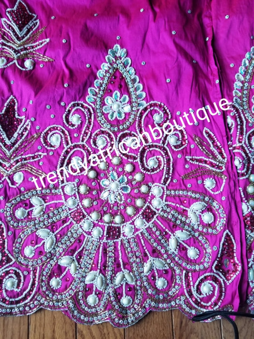 Ready to ship: luxurious Quality taffeta Silk George wrapper. Fuschia pink Nigerian Bridal beaded and crystal stoned George wrapper. Sold as  2 wrapper + 1.8yds Net for blouse. Niger/delta/Igbo traditional bridal outfit. Model shown wearing magenta color