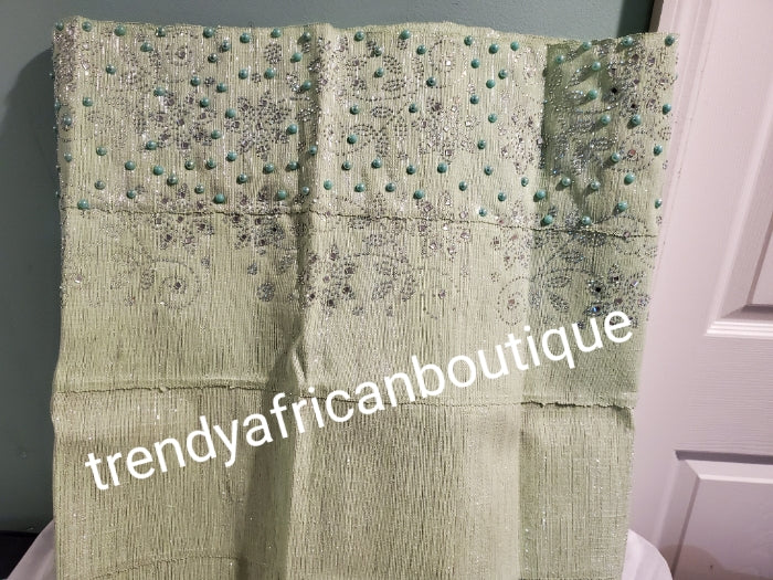 Cool mint green Bedazzled aso-oke. Nigerian woven traditional Aso-oke for making  beautiful head wrap. Beaded and Swarovski stones work for perfect headwrap finish. Gele only. Extra wide gele for bigger head wrap. 72" long × 26" wide