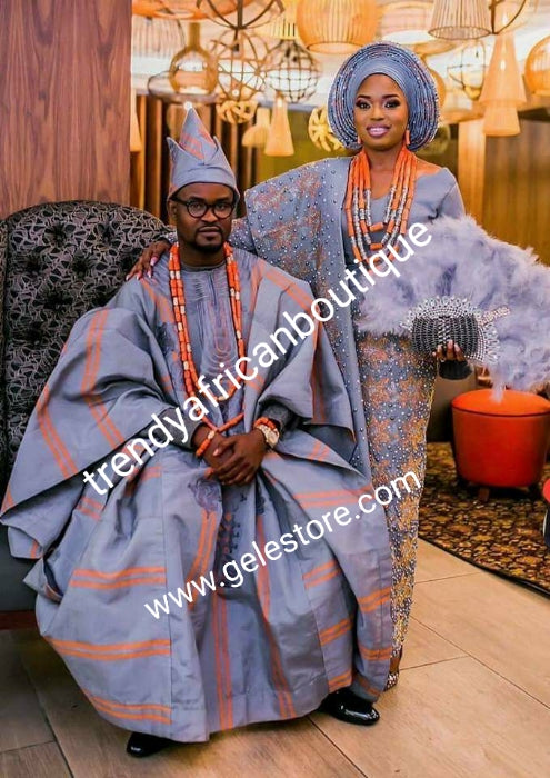 Latest Aso-oke set for Nigerian Traditional ceremonies such as weddings, Gray/orange Swarovski stones embellishment. Make-to-order only. Custom-made design. Allow 6-8 weeks for order process. Can be produce in any color of choice