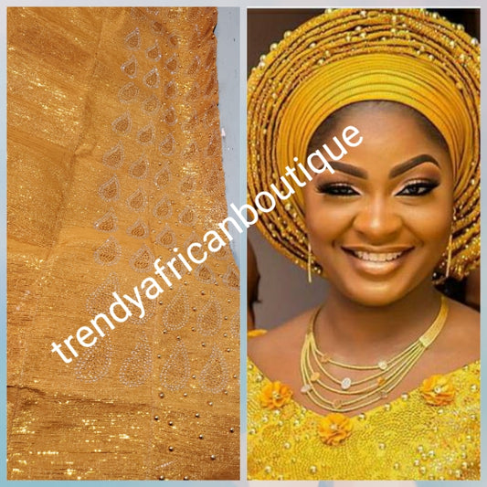 New arrival classic metallic Gold Bedazzled Aso-oke Gele headtie. 26 inch wide for making  bigger gele. classic Latest design of Nigerian Traditional aso-oke. Original aso-oke + Stone work. Great texture and easy to make into stylish gele