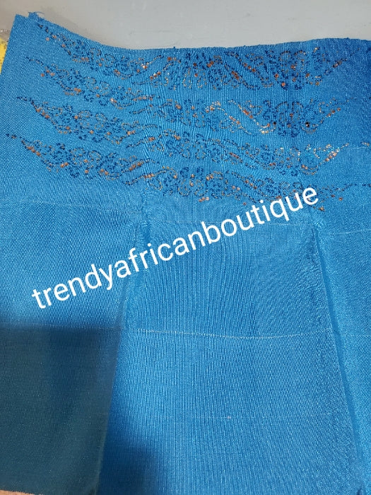 Quality  turquoise blue Bedazzled aso-oke. Nigerian woven traditional Aso-oke for making stylish head wrap. Beaded and Swarovski stones work for perfect headwrap finish. Gele only. Extra wide gele for bigger head wrap. 72" long × 26" wide