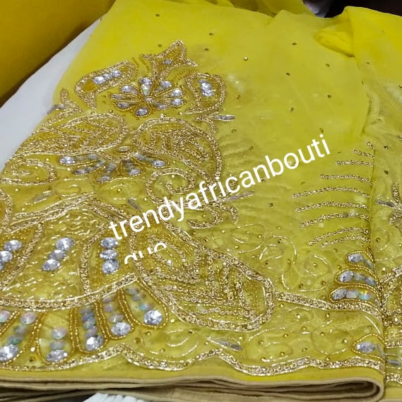 Ready to Ship: Gorgeous Igbo Traditional Bridal outfit- quality yellow net George wrapper and matching net for blouse. embellished with dazzling Crystal stones all over. 2 wrapper + 1.8yds net for blouse. Sweet yellow net Ideal for making Celebrant outfit