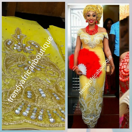 Ready to Ship: Gorgeous Igbo Traditional Bridal outfit- quality yellow net George wrapper and matching net for blouse. embellished with dazzling Crystal stones all over. 2 wrapper + 1.8yds net for blouse. Sweet yellow net Ideal for making Celebrant outfit