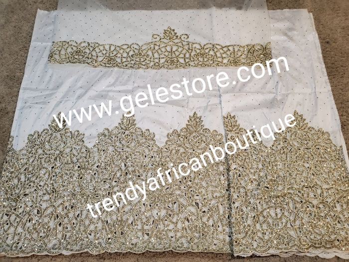 Ready to ship. Pure white Original Quality VIP all over shining Crystal stoned George wrapper. Igbo/delta/Niger Bridal George wrappee in 2.5yds + 2.5yds  + 1.8 yds matching net blouse. Feel the difference in quality Taffeta crystal stoned wrapper
