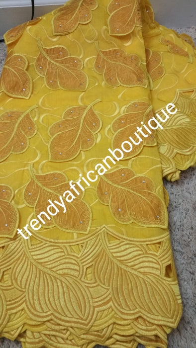 Special Sale: Original Swiss Embriodery Lace fabric embellished with organza leaf petals. classic Bold Border.  Great quality and texture for that special occasion. Sold per 5yds. Price is for 5yds