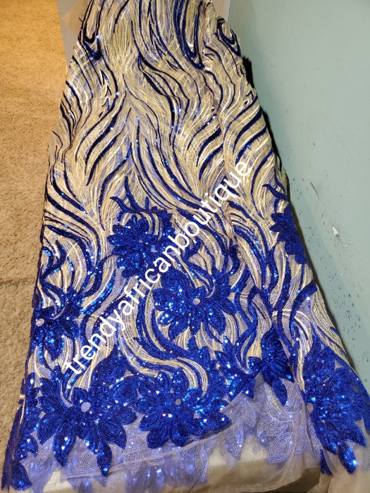 New arrival soft quality champagne/royalblue french lace fabric with all over sequence. Great quality. Sold per 5yds.price is for 5yds. Aso-ebi price available. Contact us for details. Free shipping within U.S