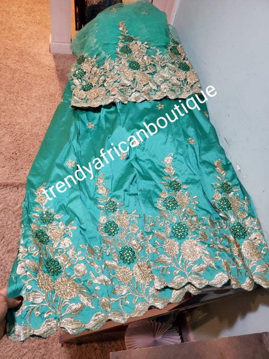 Mint green/gold  embriodery stone taffeta silk George fabric. Top quality Indian-George for making Nigerian/African party dress. 5yds George + 1.8yds matching net blouse. Contact us if you are interested in Aso-ebi order