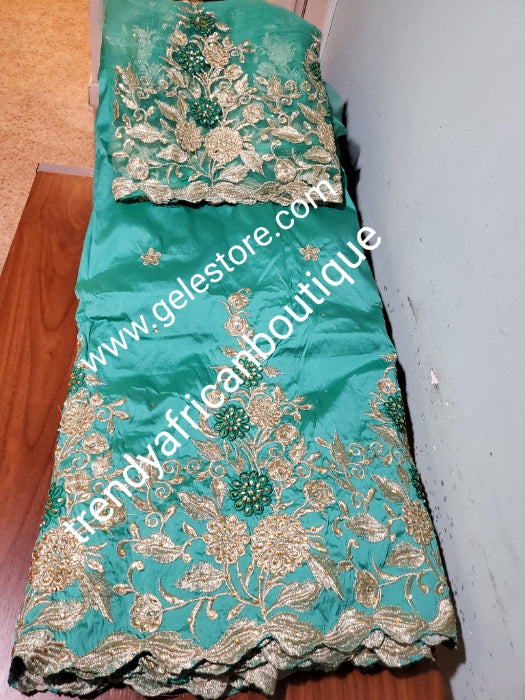 Mint green/gold  embriodery stone taffeta silk George fabric. Top quality Indian-George for making Nigerian/African party dress. 5yds George + 1.8yds matching net blouse. Contact us if you are interested in Aso-ebi order
