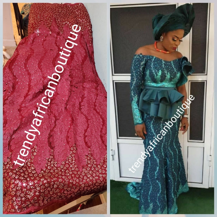 Sale sale: Lustrous quality Africa french lace fabric over sequence. Wine embeliished with gold sequence border. Sold per 5yds,  limited quantity. Sold per 5yds lenght, price is for 5yds. Feel the difference in quality