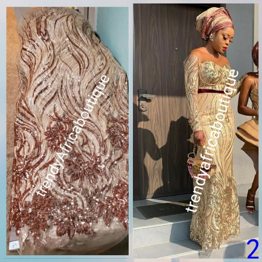 New arrival soft quality champagne/rose gold  french lace fabric with all over sequence. Great quality. Sold per 5yds.price is for 5yds. Aso-ebi price available. Contact us for details. Free shipping within U.S