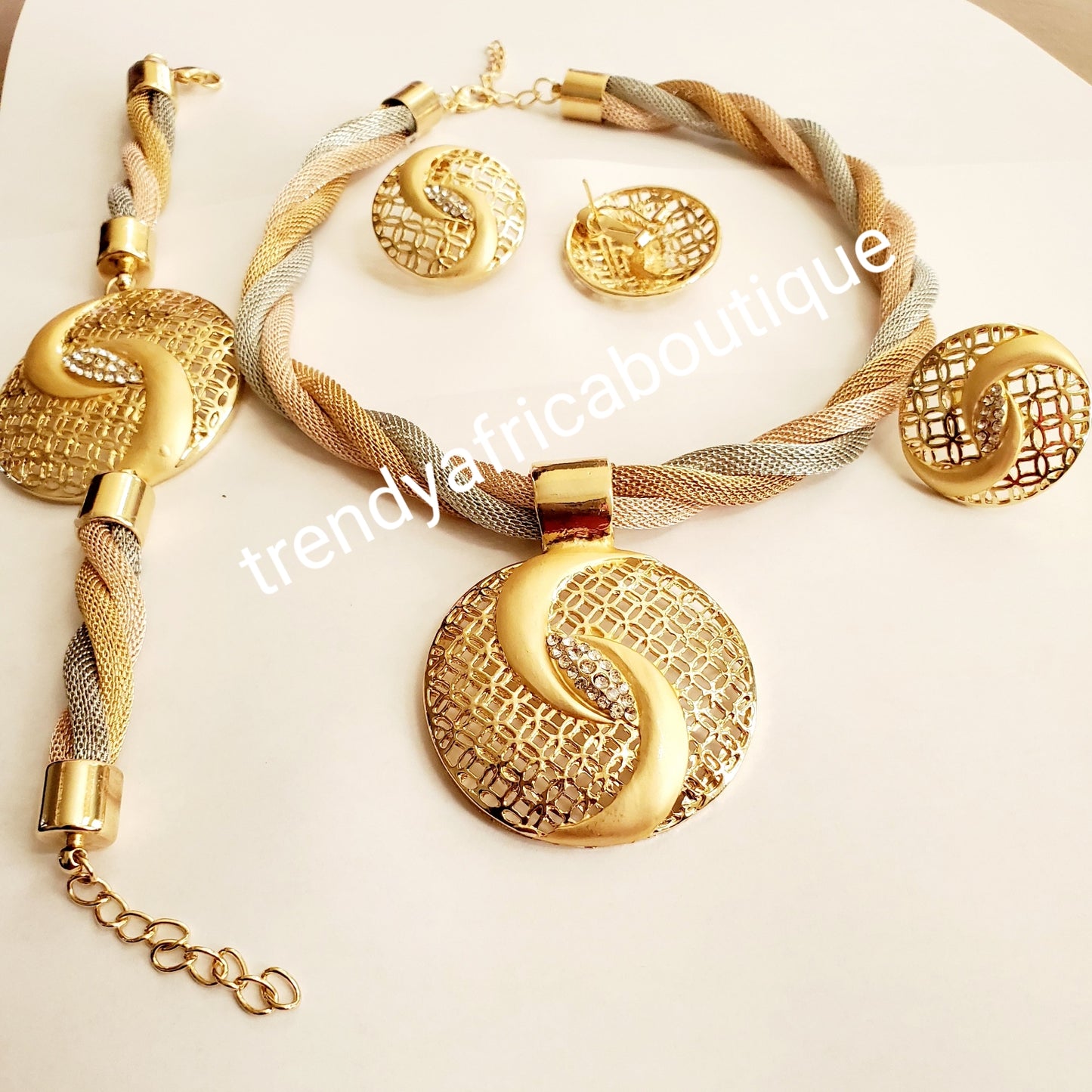 High quality 3 tone18k plated 4pc necklace  set.  beautiful hypoallergenic choker with matching earring, adjustable ring & a bracelet. Sold as set, price is for the set. Classic for casual wear.
