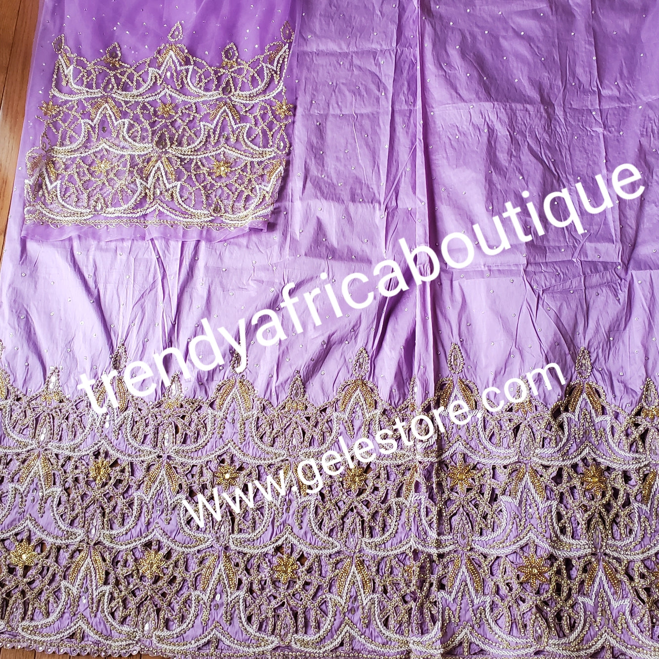 Special offer: Beautiful Lilac Nigerian traditional Igbo/delta women wrapper for big ceremoney. Original quality silk George wrapper for Traditional wedding oufit. Sold as 2  wrapper  of 2.5yds + 2.5yds + 1.8yds matching net for blouse