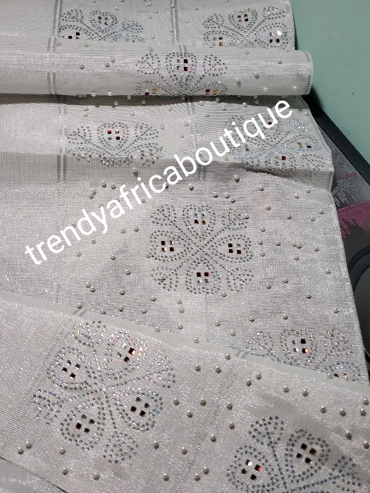 Classic silver Beaddazzled aso-oke for making Nigerian latest party Gele.  Embellished with Clear and colored crystal stones. woven quality aso-ebi 82" long x 20" wide