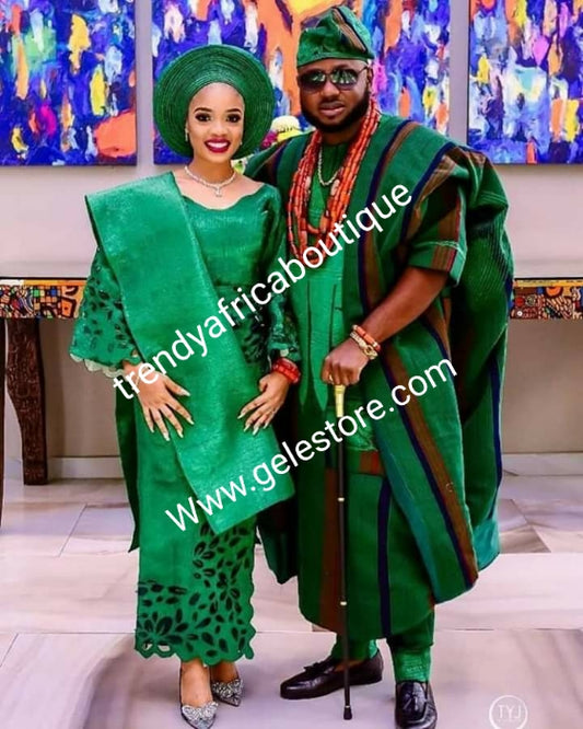 Celebrant Aso-oke made for Nigerian Traditional ceremonies,  Make-to-order only. Custom-made in any color combination of your choice. Groom 4pcs set is all aso-oke, bride compliments laser cut aso-oke.Allow 6-8 weeks for order process. Green/orange/navy.