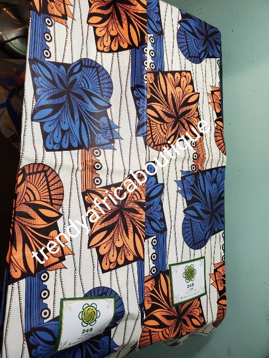Cream/orange/royalblue Veritable African wax print fabric. 100% cotton Ankara print for making African party outfit for men and women. Sold per 6yds and price is for 6yds. Soft luxurious Quality fabric