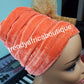 Orange velvet turban with gold color side design Women-turban. One size fit all turban. Beautiful flower design with a side brooch/beaded and stoned to add decor to your turban