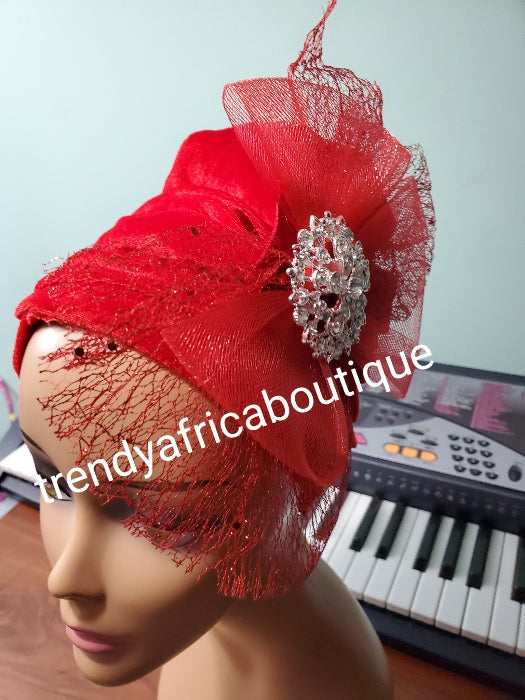 Red velvet Women-turban. One size fit all turban. Beautiful flower side design with a side brooch to add decor to your turban. Soft velvet material