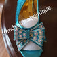 Europe size 38 Turquoise shoe and clutch set, dazzling crytal stones. Platform heal with matching stylish hand clutch. Comfortable and good balance shoe. True to size.