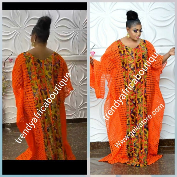 3pcs set sturning dry lace Senegalese bubu embellished with dazzling swaroski crystal stones. Comes with long inner and head tie. Made with quantity swiss dry lace. Senegalese design. Exclusive and a must have in your wardrobe!! Orange lace