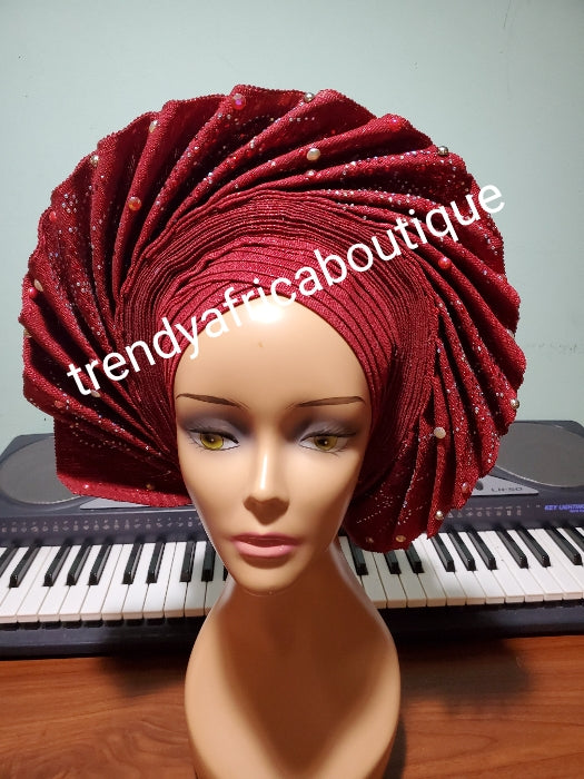 New arrival Wine auto-gele fan design beaded and stoned. made with Nigerian woven  aso-oke.  Party ready in less than 5 minutes. One size fit, easy adjustment at the back