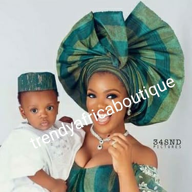Nigeria aso-oke teal green/light gold as in model photo. Buba/iro 2 tone. + gele/ipele solid color teal green.Make-to-order. Custom-made design. Allow 6-8 weeks for order process.