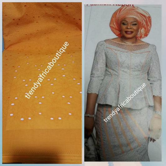 Sale: Orange color Quality dry swiss lace fabric for African traditional native wear. Sold per 5yds.. price is for 5yds