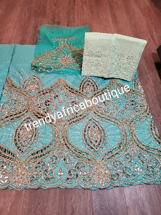 Ready to ship:  Mint Green VIP hand beaded and stoned Nigerian traditional Celebrant George wrapper with matching blouse. With a choice of mint green gele. Niger/Delta/Igbo wrapper Quality George wrapper for high society party.