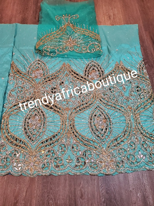 Ready to ship:  Mint Green VIP hand beaded and stoned Nigerian traditional Celebrant George wrapper with matching blouse. With a choice of mint green gele. Niger/Delta/Igbo wrapper Quality George wrapper for high society party.