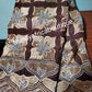 Sale: chocolate brown/cream soft texture swiss voile lace. Sold per 5 yards and price is for 5 yards.