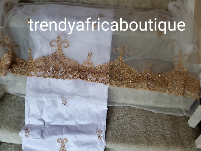 Original quality White/gold embriodery and beaded silk George wrapper. Nigerian traditional wedding George, Quality Indian-George. 5yds wrapper + 1.8yds net matching blouse. Aso-ebi available. Contact us for detail.