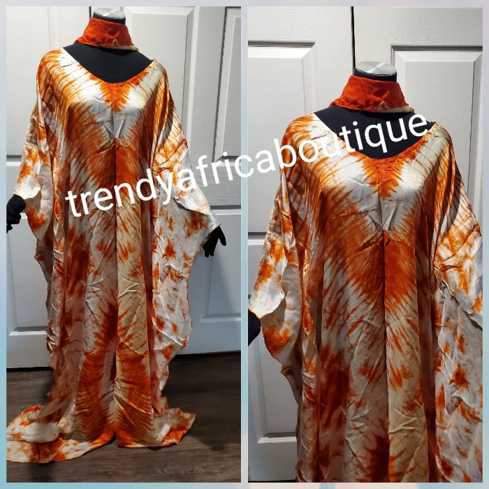 silk adire agbada bubu for ladies. Tie and dye or kampala full lenght 60inc long. Off white + orange color. Grade A quality one size fit up to 1xL