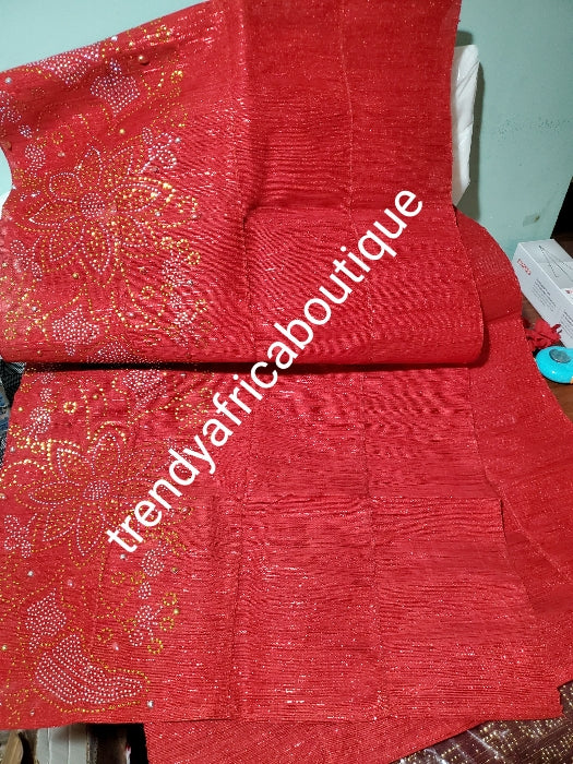 Pepper Red Nigerian Aso-oke Gele. Extra wide and long. Beaded and stoned soft easy to tie Aso'-oke for making Nigerian Gele. Sold as gele only. If you like to order for aso-ebi, please contact us directly