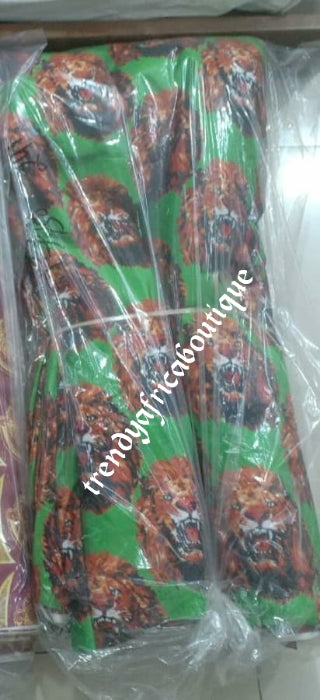 Quality Green/Gold Isi-agu Igbo traditional wrapper use for men shirt or women wrapper. Sold per yard, price is for one yard. Nigerian/igbo ceremonia fabric. Soft texture velvet mix, authentic isi-agu fabric for Igbo title ceremony.