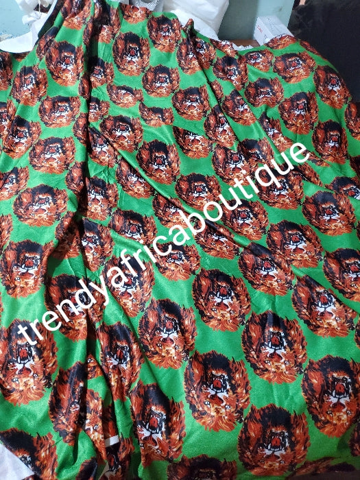 Quality Green/Gold Isi-agu Igbo traditional wrapper use for men shirt or women wrapper. Sold per yard, price is for one yard. Nigerian/igbo ceremonia fabric. Soft texture velvet mix, authentic isi-agu fabric for Igbo title ceremony.